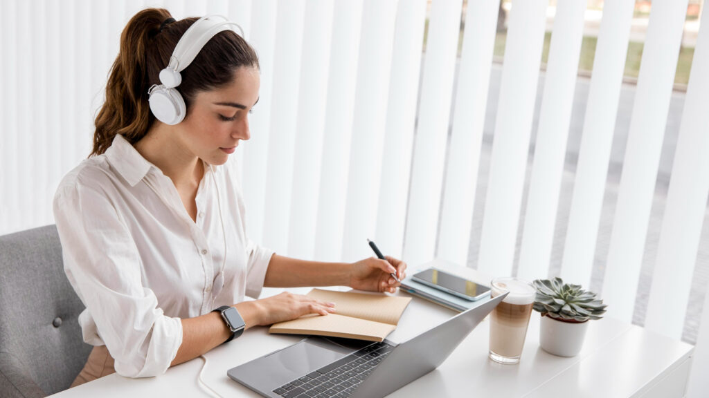 Businesswoman Working With Laptop Headphones 1024x576